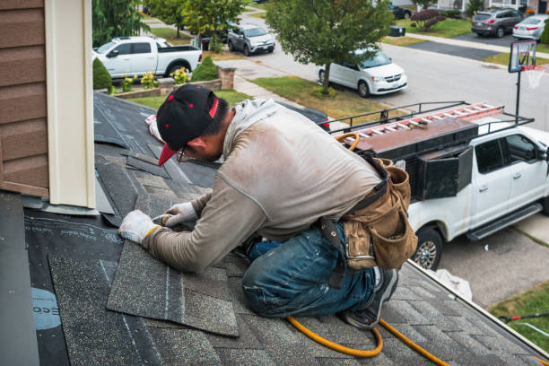 Professional Roofing technician working in Essex, MD